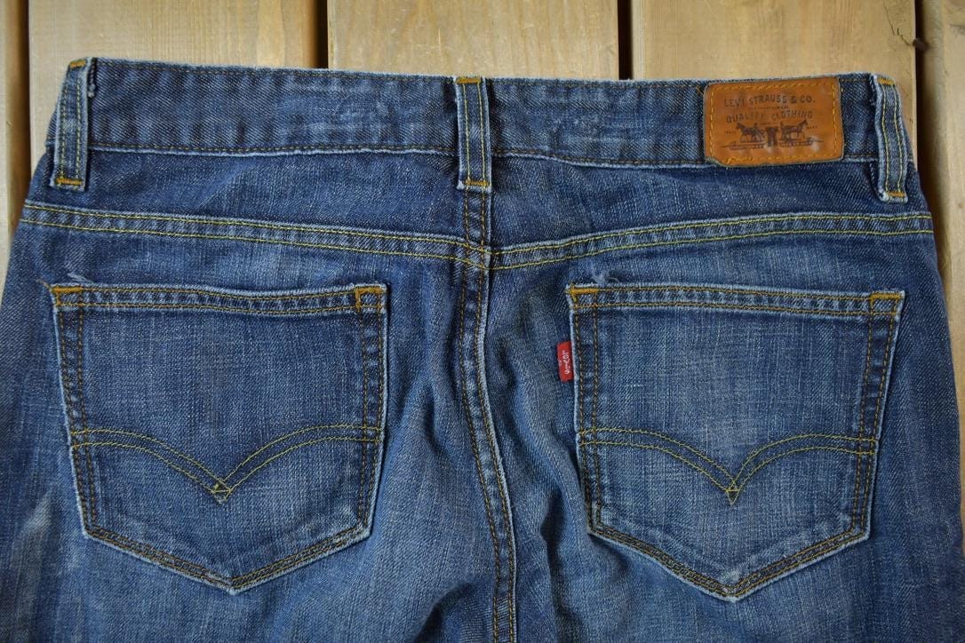 Vintage 2000s Levis Red Tab 534 Low Flare Denim Jeans Women's 30 x 32 from propervintagecanada