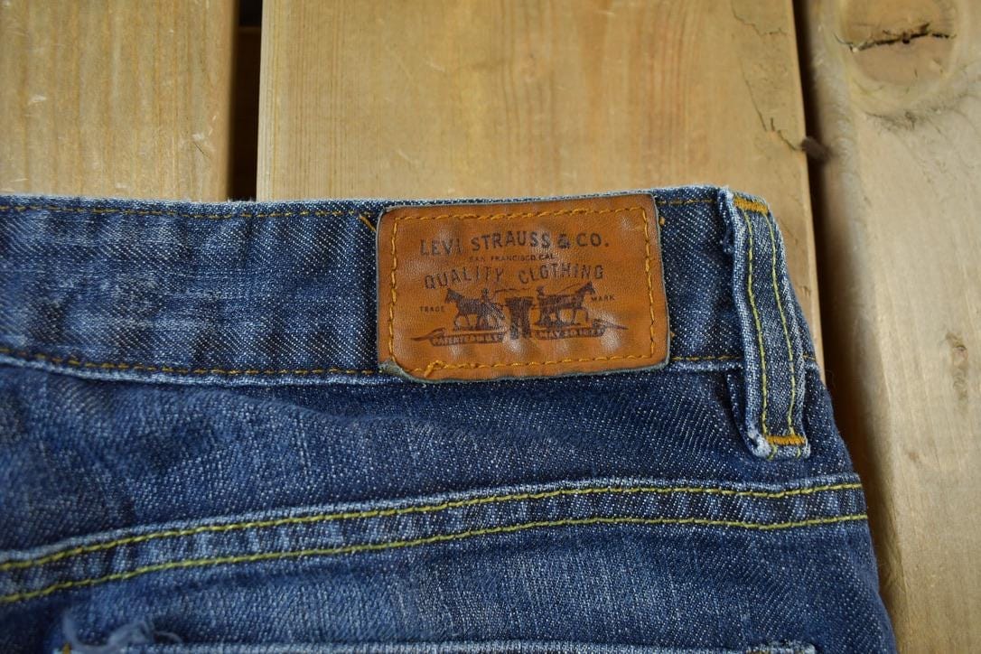 Vintage 2000s Levis Red Tab 534 Low Flare Denim Jeans Women's 30 x 32 from propervintagecanada