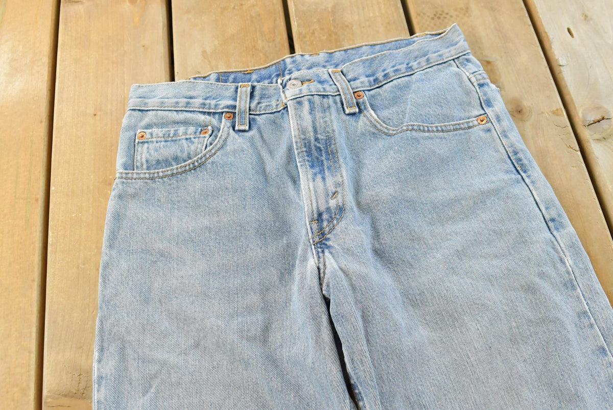 Vintage 2000s Levis Relaxed Fit Tapered Leg 550 Denim Blue Jeans Men's 30 x 31 from propervintagecanada