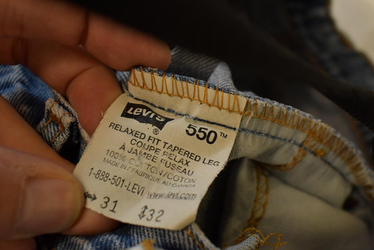 Vintage 2000s Levis Relaxed Fit Tapered Leg 550 Denim Blue Jeans Men's 30 x 31 from propervintagecanada