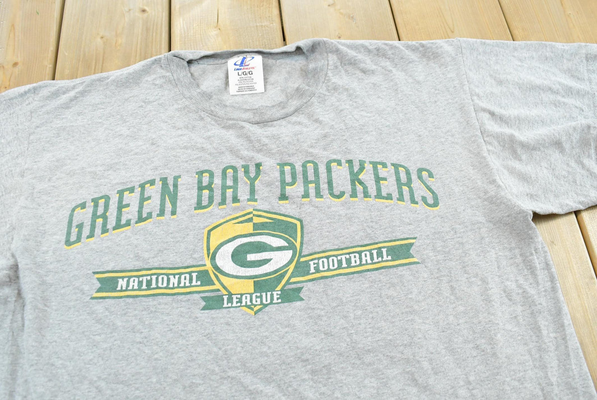 Vintage 2000s Logo Athletic Green Bay Packers Graphic T Shirt Mens L from propervintagecanada