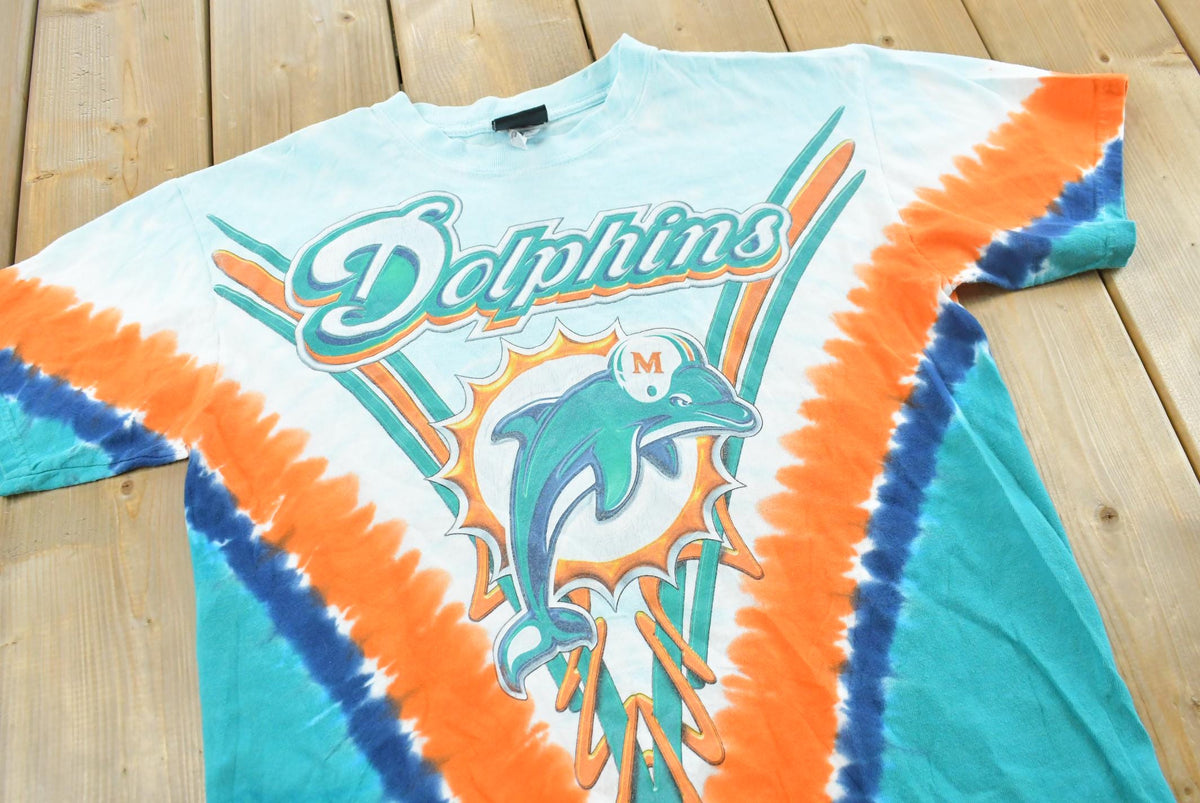 Vintage 2000s Miami Dolphins NFL Liquid Blue Tie Dye Graphic T-Shirt Men's Men's Medium from propervintagecanada