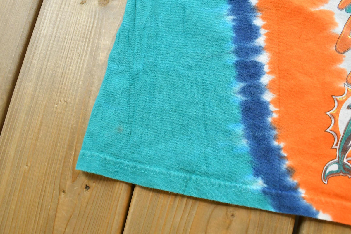 Vintage 2000s Miami Dolphins NFL Liquid Blue Tie Dye Graphic T-Shirt Men's Men's Medium from propervintagecanada