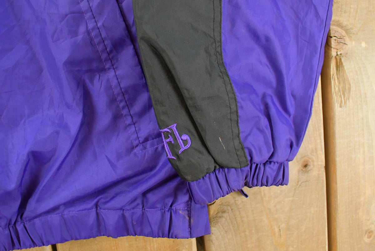 Vintage 2000s Minnesota Vikings NFL Pullover Windbreaker Jacket Men's Medium from propervintagecanada