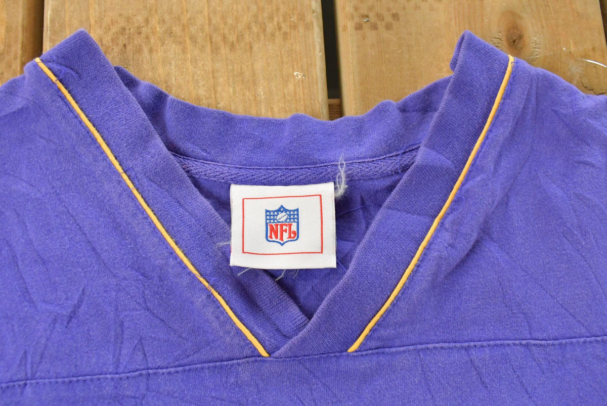 Vintage 2000s Minnesota Vikings NFL V-Neck T-Shirt Men's XL from propervintagecanada