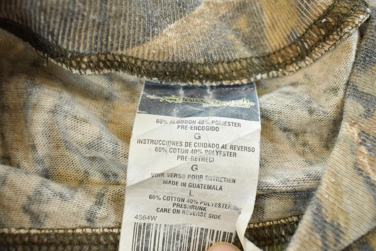 Vintage 2000s Mossy Oak Shadow Branch RealTree Camo T-Shirt Men's Large from propervintagecanada