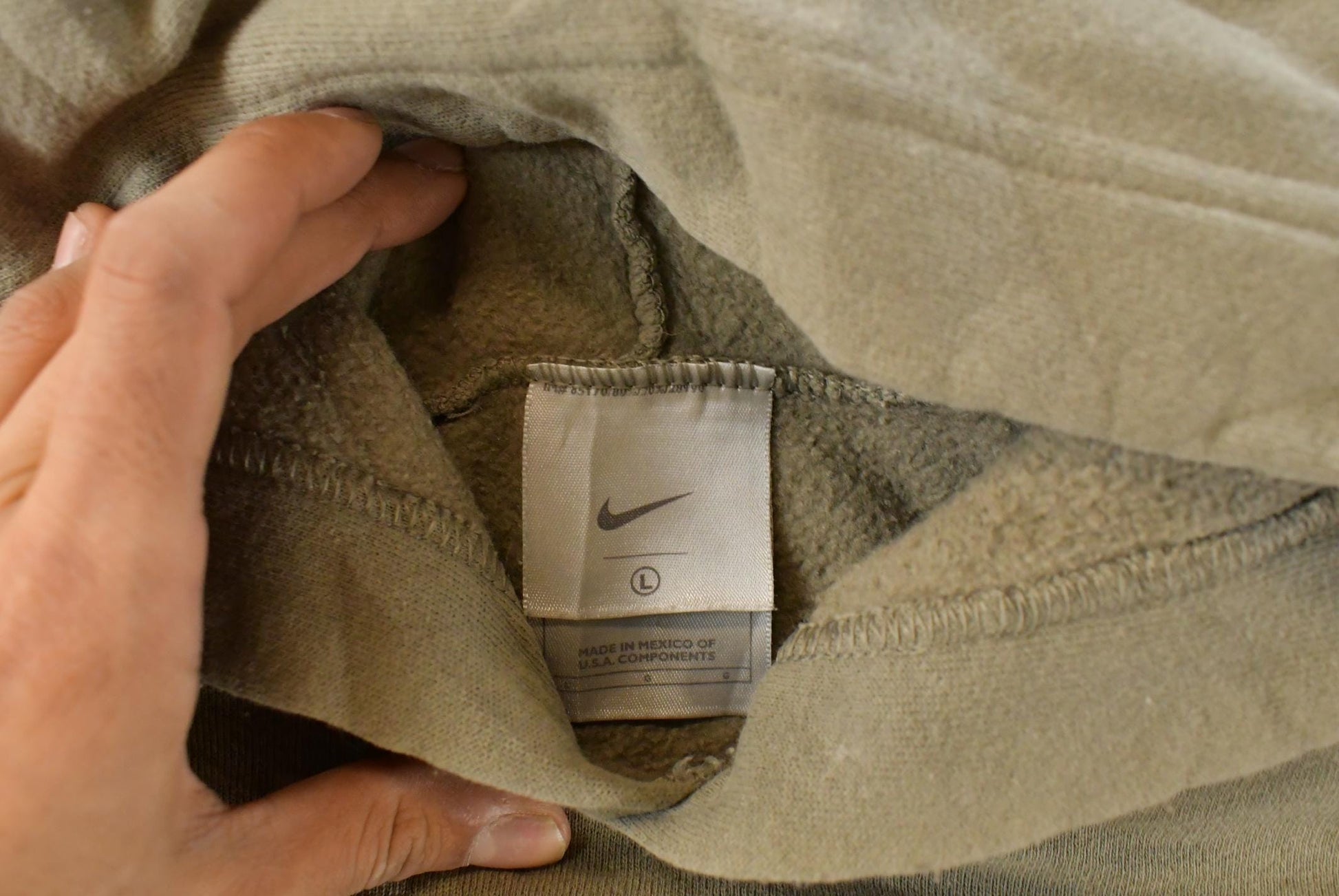 Vintage 2000s Nike Embroidered Mini Middle Swoosh Hoodie Men's Large from propervintagecanada