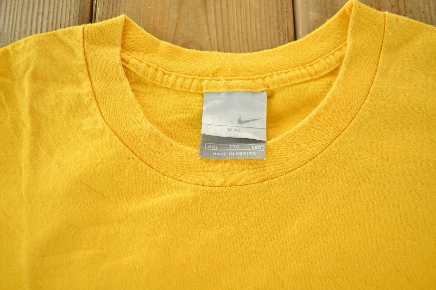 Vintage 2000s Nike Embroidered Swoosh Graphic T-Shirt from propervintagecanada