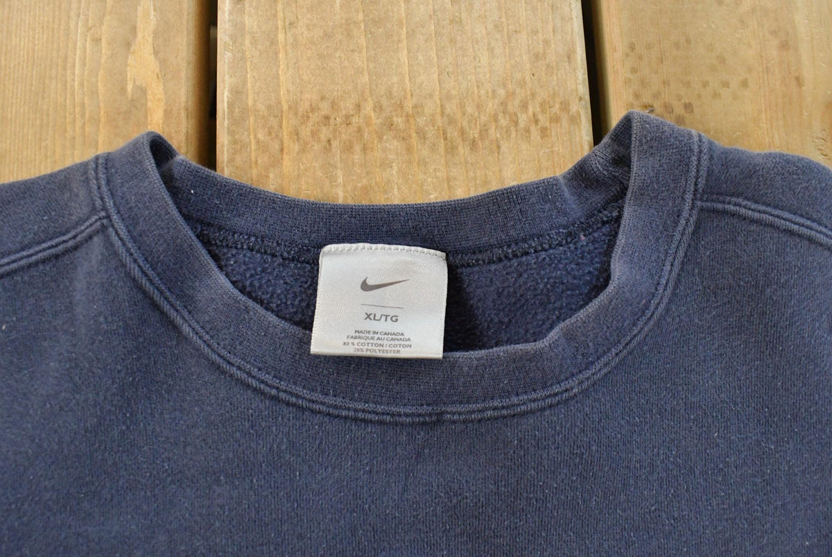 Vintage 2000s Nike Mini Swoosh Crewneck Sweatshirt Men's XL from propervintagecanada