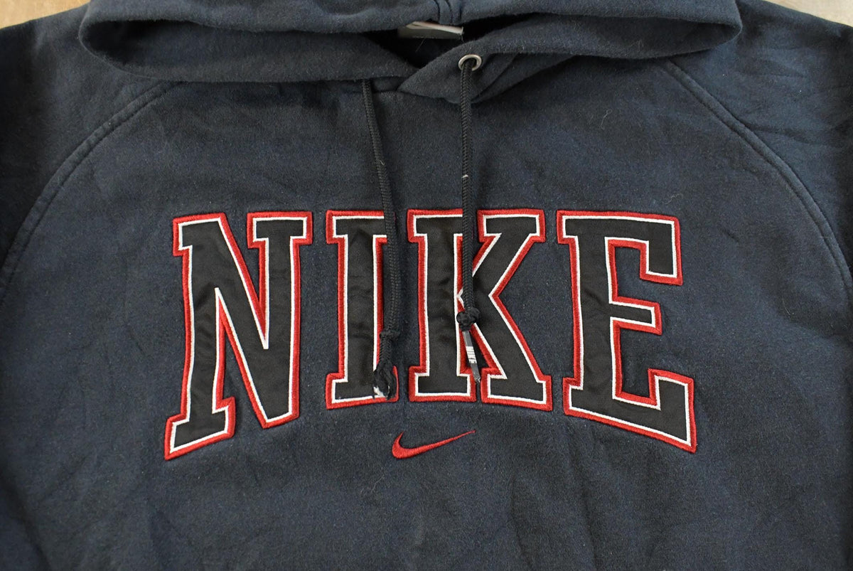 Vintage 2000s Nike Spellout Swoosh Hoodie Sweatshirt Men's M from propervintagecanada