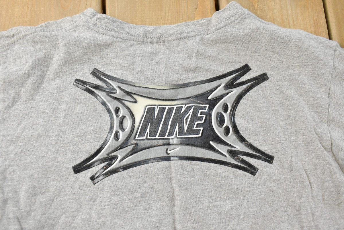 Vintage 2000s Nike Swoosh Graphic T-Shirt Youth M from propervintagecanada