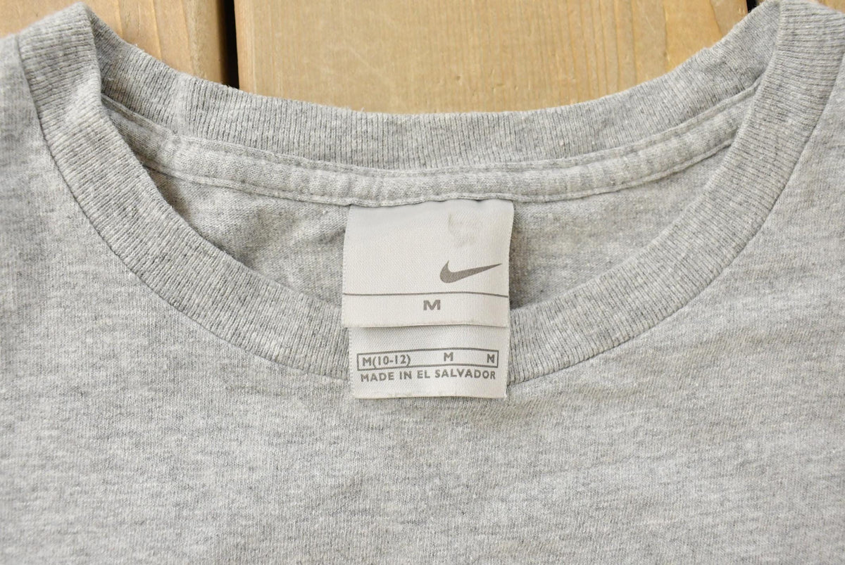 Vintage 2000s Nike Swoosh Graphic T-Shirt Youth M from propervintagecanada