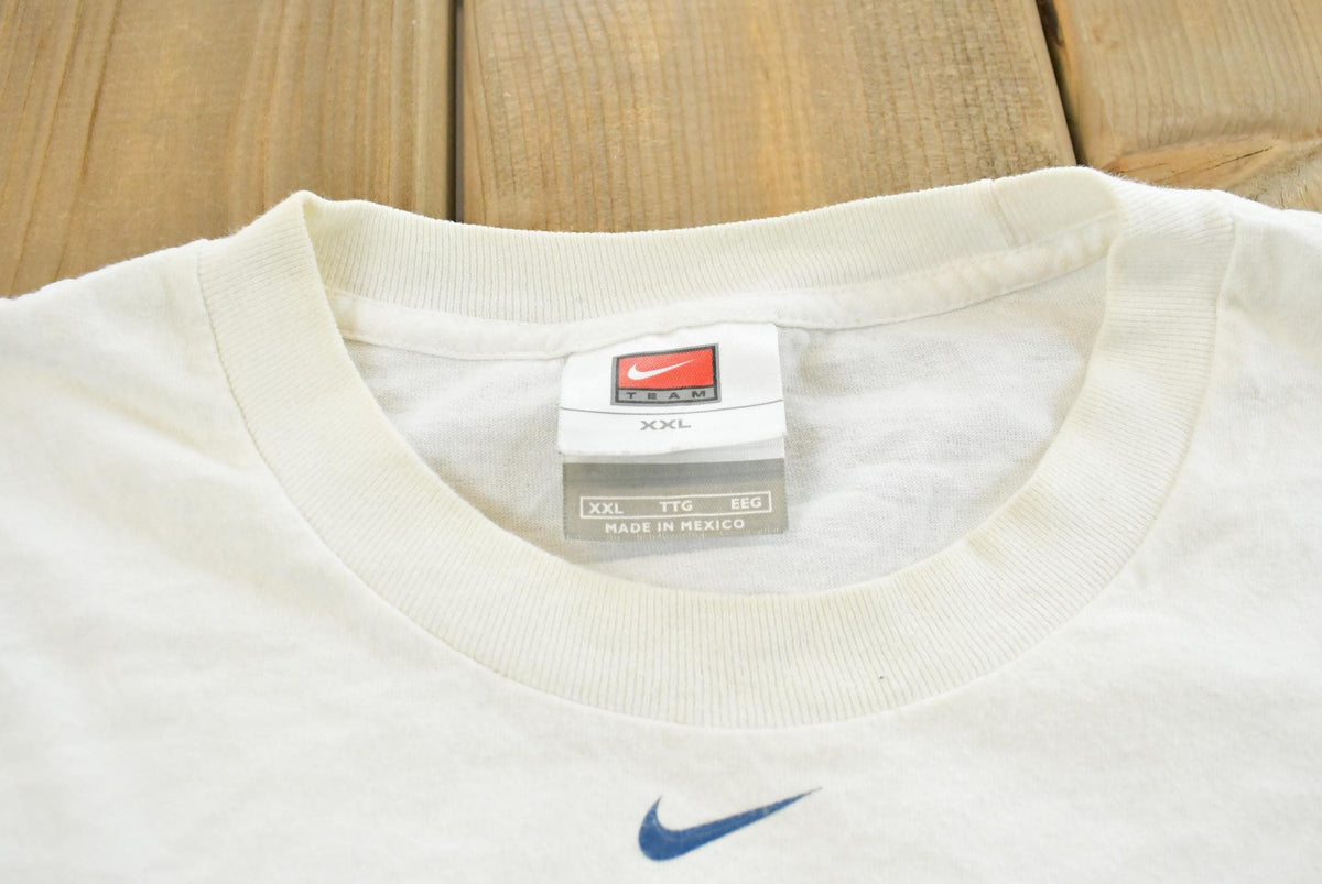 Vintage 2000s Nike Team Middle Swoosh Minnesota Timberwolves Long Sleeve Shirt Mens 2XL from propervintagecanada