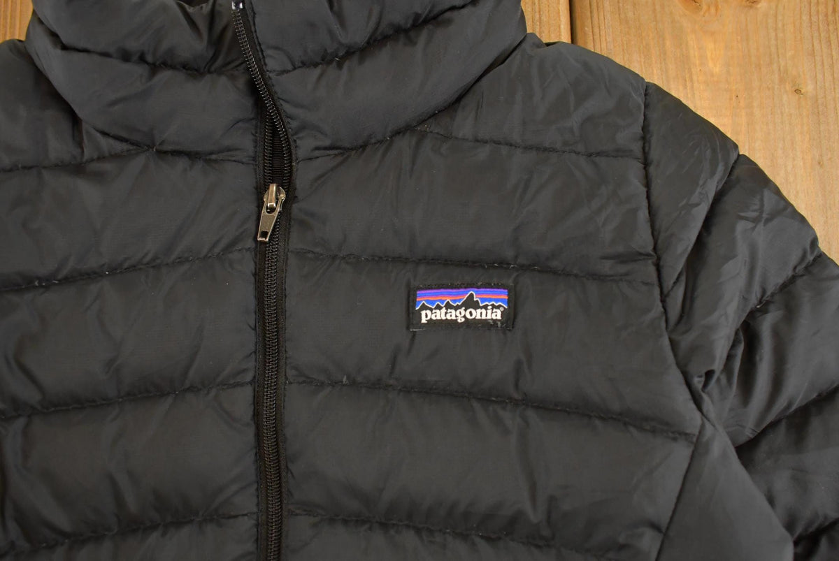 Vintage 2000s Patagonia Full Zip Down Light Puffer Jacket Youth M from propervintagecanada