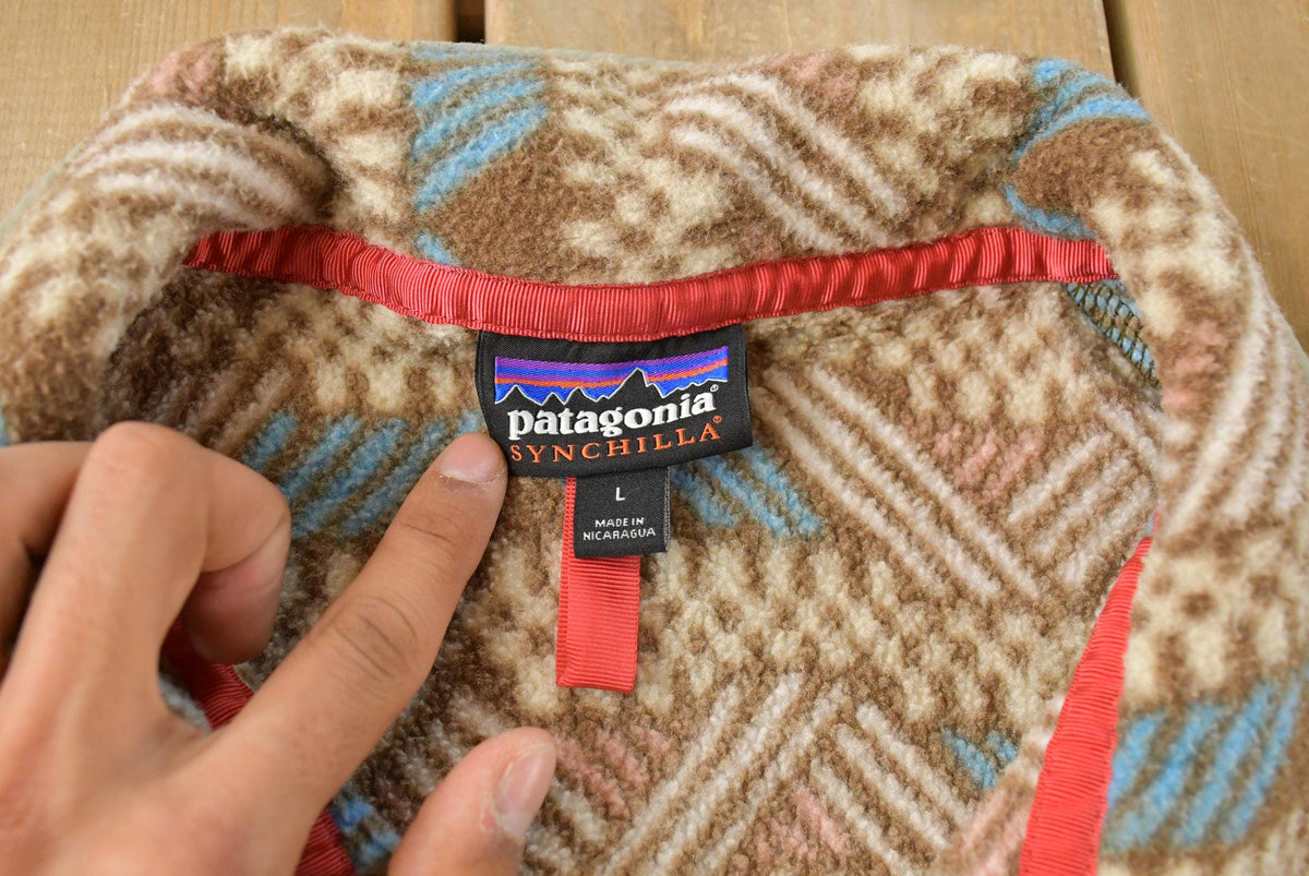 Vintage 2000s Patagonia Synchilla Aztec Navajo Fleece Snap T Fleece Sweater Men's Large from propervintagecanada
