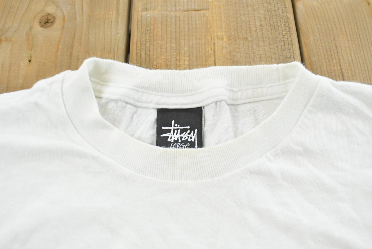 Vintage 2000s Stussy Money Folda!! Graphic Print T-Shirt Men's L from propervintagecanada