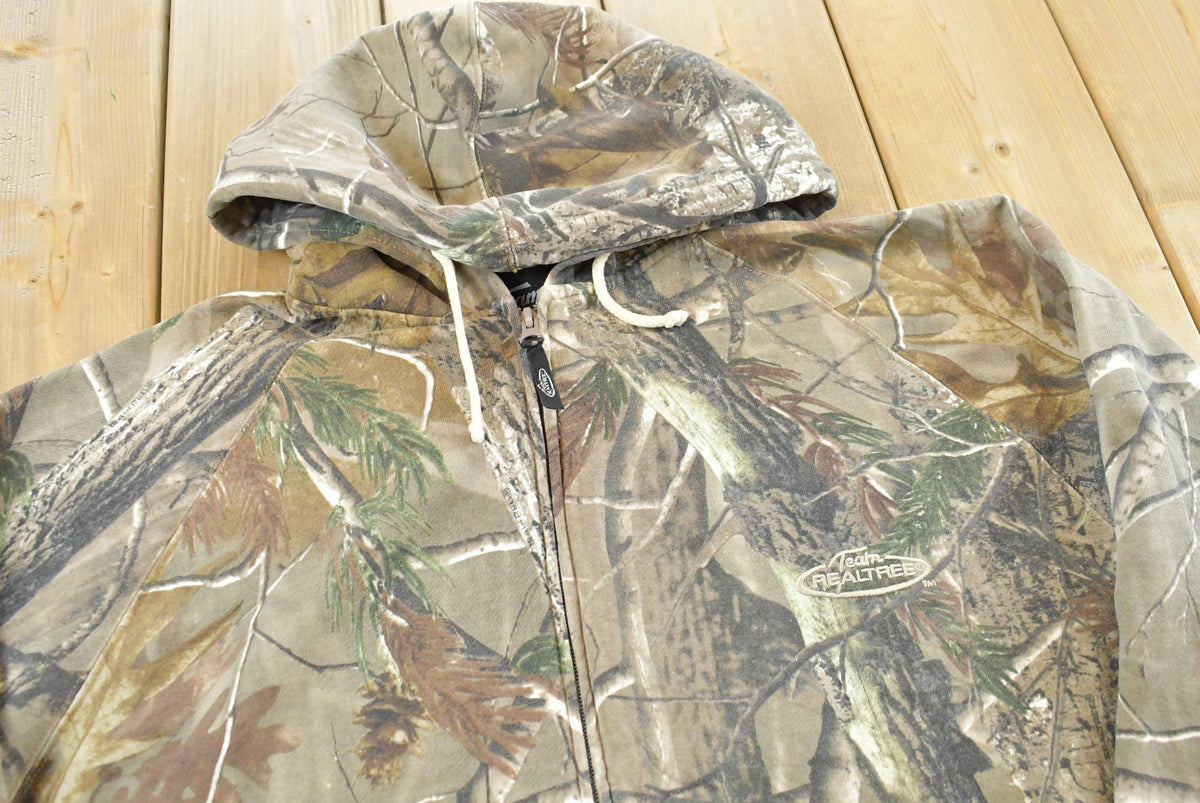 Vintage 2000s Team Realtree Camo Full Zip Hoodie Sweatshirt Men's XL from propervintagecanada