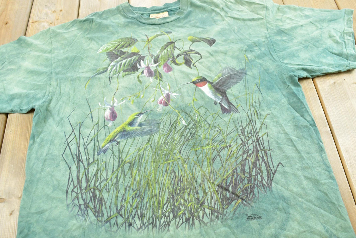 Vintage 2000s The Mountain Hummingbird Garden Tie Dye T-Shirt Men's XL from propervintagecanada