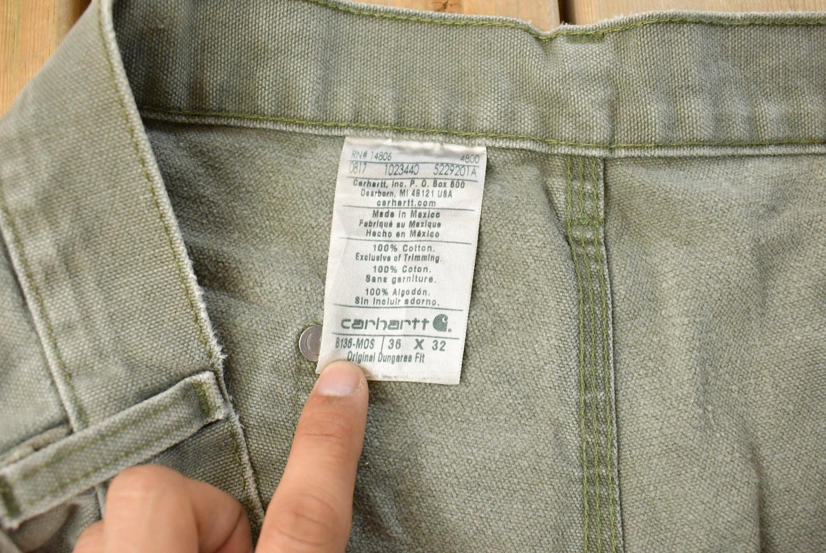 Vintage 2000s Thrashed Carhartt Carpenter Pants Men's 35 x 31 from propervintagecanada