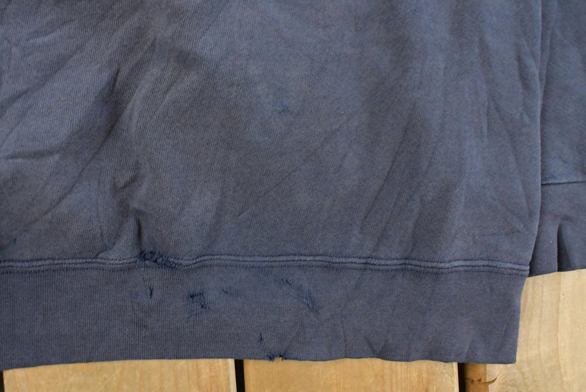 Vintage 2000s Thrashed Nike Embroidered Mini Middle Swoosh Hoodie Men's L from propervintagecanada
