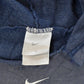 Vintage 2000s Thrashed Nike Embroidered Mini Middle Swoosh Hoodie Men's L from propervintagecanada