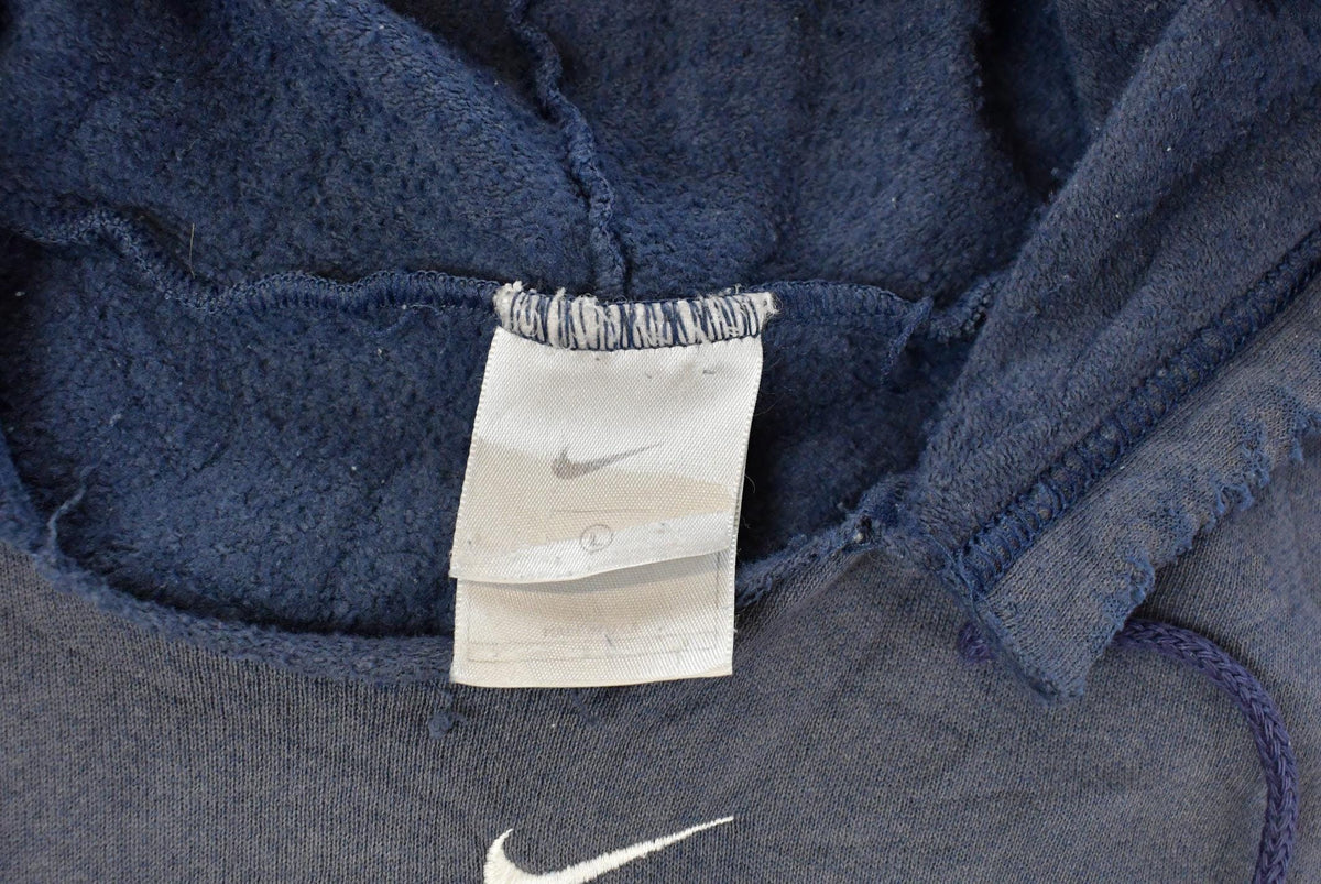 Vintage 2000s Thrashed Nike Embroidered Mini Middle Swoosh Hoodie Men's L from propervintagecanada