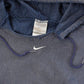 Vintage 2000s Thrashed Nike Embroidered Mini Middle Swoosh Hoodie Men's L from propervintagecanada
