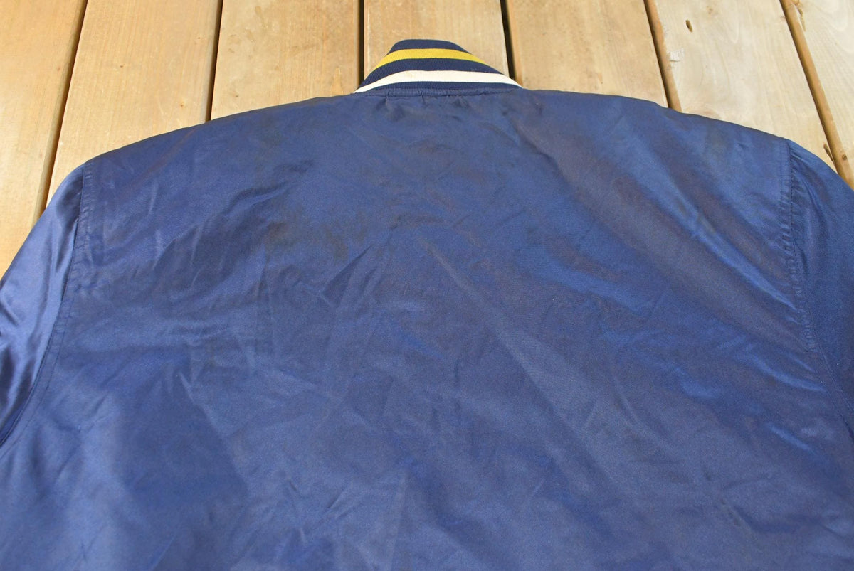 Vintage 2000s University of Michigan Wolverines Nylon Satin Bomber Jacket Men's XL from propervintagecanada