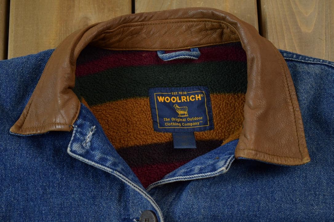 Vintage 2000s Woolrich Fleece Lined Denim Trucker Jacket Women's M from propervintagecanada