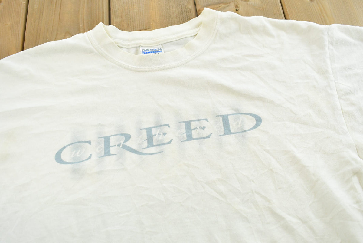 Vintage 2001 Creed Weathered Tour Rock Band T-Shirt Men's L from propervintagecanada