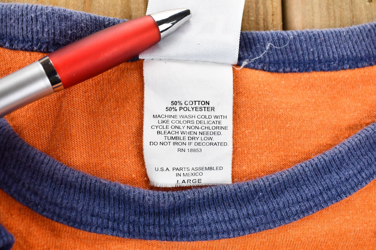 Vintage 2005 Dracula Night of the Vampire Orange and Blue Ringer Graphic T-Shirt Men's Large from propervintagecanada