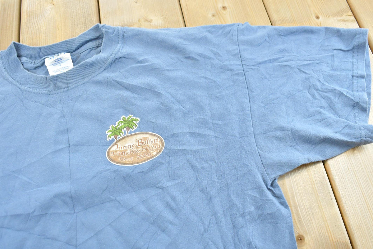 Vintage 2005 Jimmy Buffett A Salty Piece of Land Tour T-Shirt Men's XL from propervintagecanada