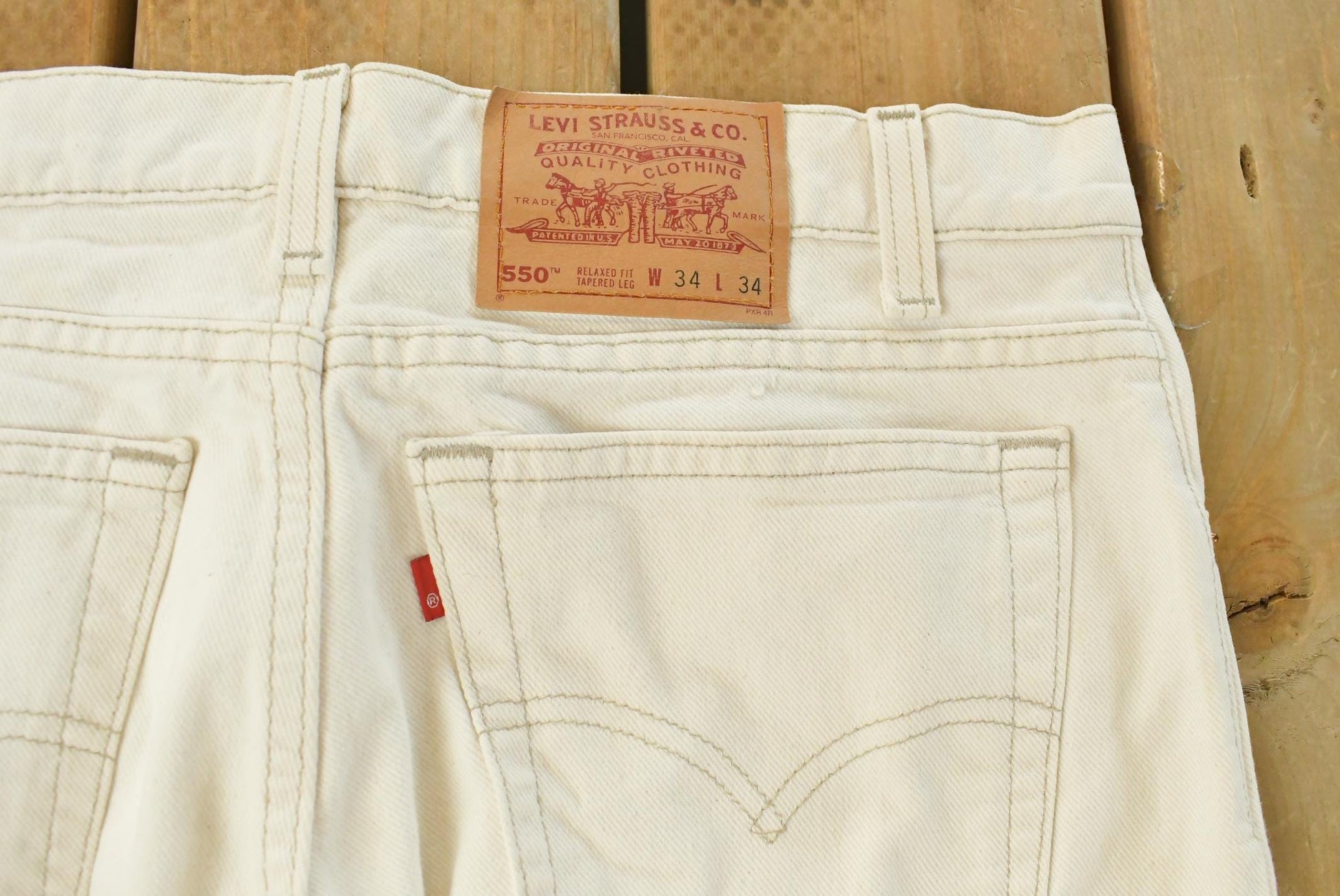 Vintage 90s Levi's 550 Relaxed Tapered Denim Jeans Men's 33 x 34 from propervintagecanada