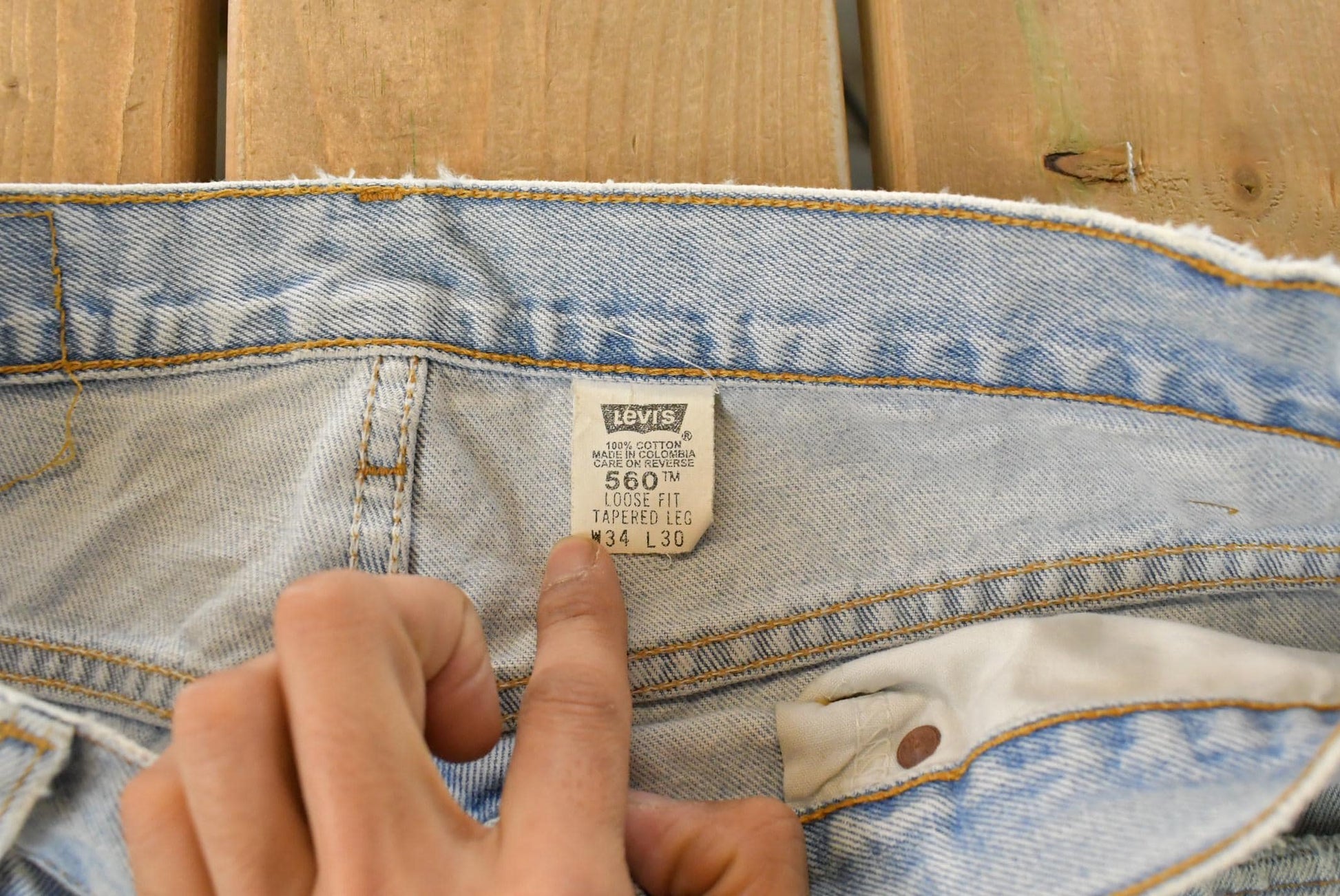 Vintage 90s Levi's 560 Jeans: Distressed Loose Tapered Fit, 32x29 from propervintagecanada