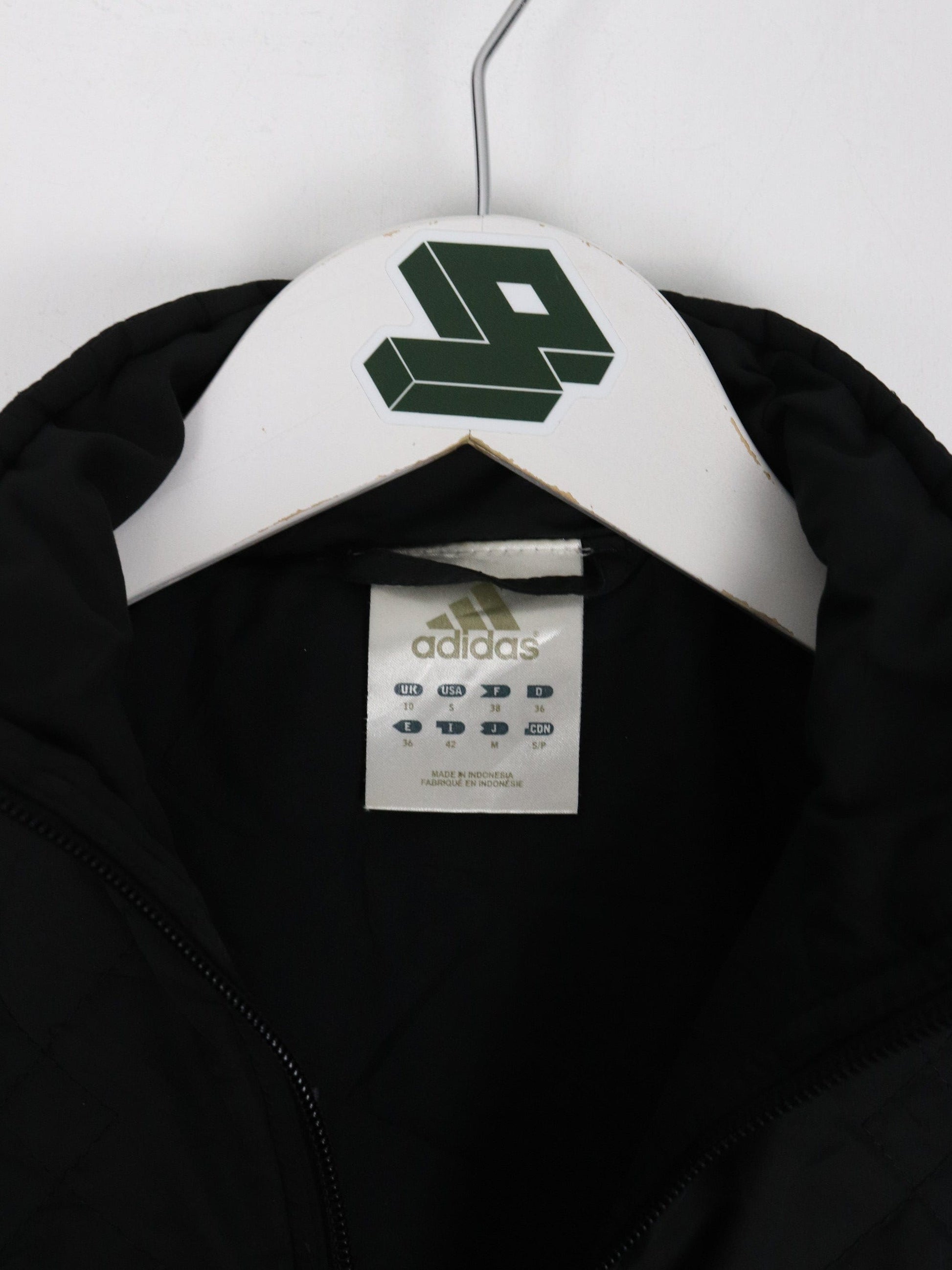 Vintage Adidas Jacket Womens Small Black Quilt Y2K Coat from propervintagecanada