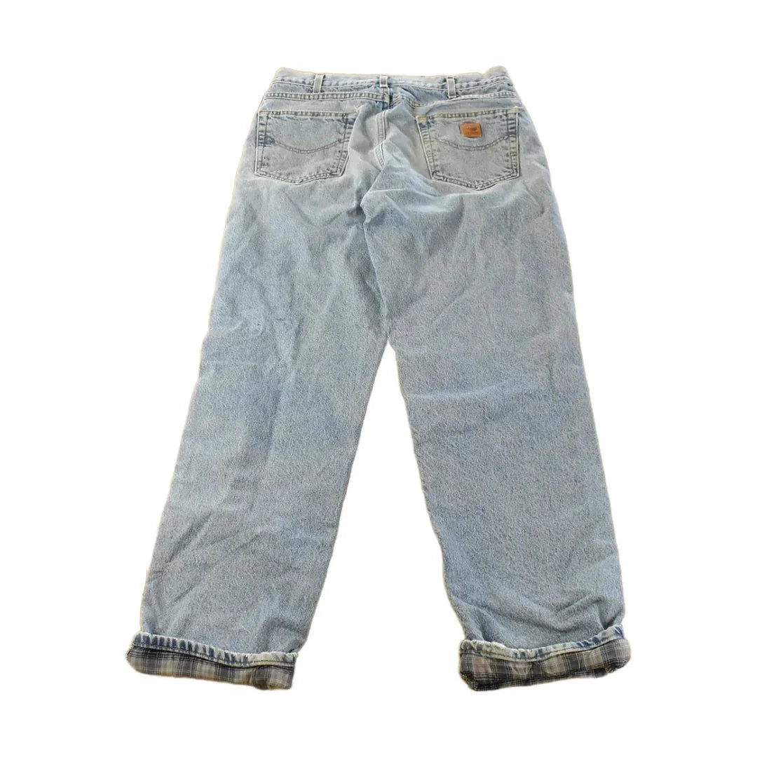 Vintage Carhartt Flannel Lined Denim Jeans, Men's 33x33, Distressed Workwear from propervintagecanada