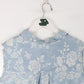 Vintage Dockers Shirt Womens Small Blue Floral Button Up Vest from propervintagecanada