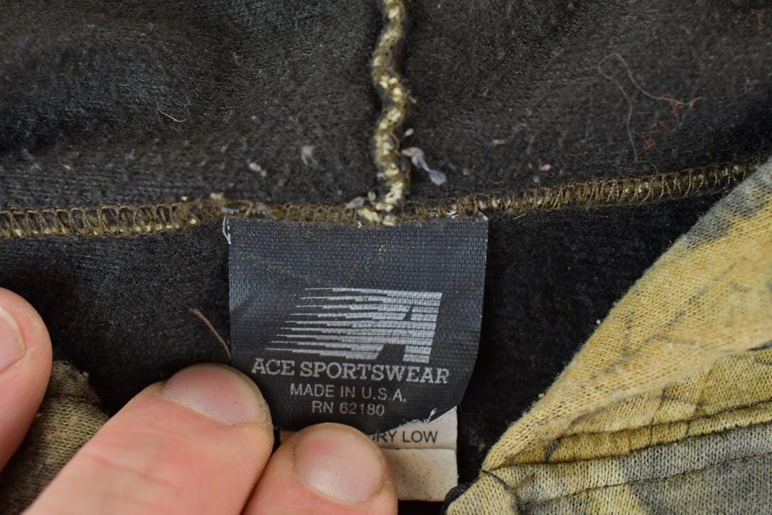 Vintage Early 1990s Ace Sportswear Realtree Camo Full Zip Graphic Hoodie Men's XL from propervintagecanada