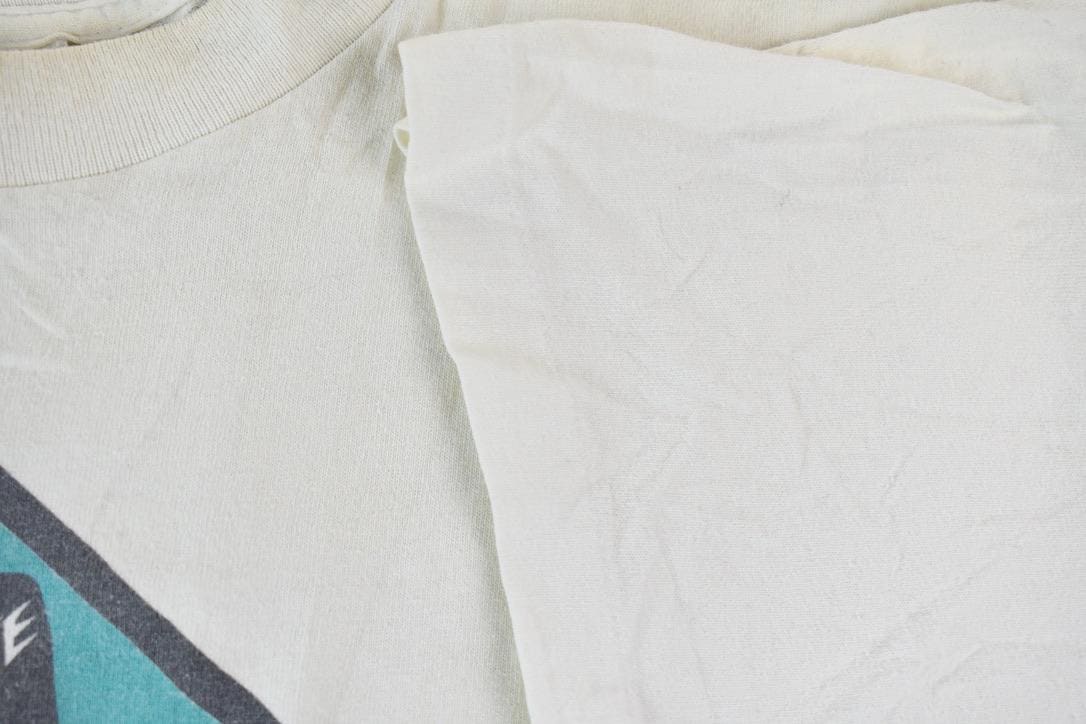 Vintage Early 1990s Myers' Rum Shark Bite Single Stitch Graphic T-Shirt Men's M from propervintagecanada