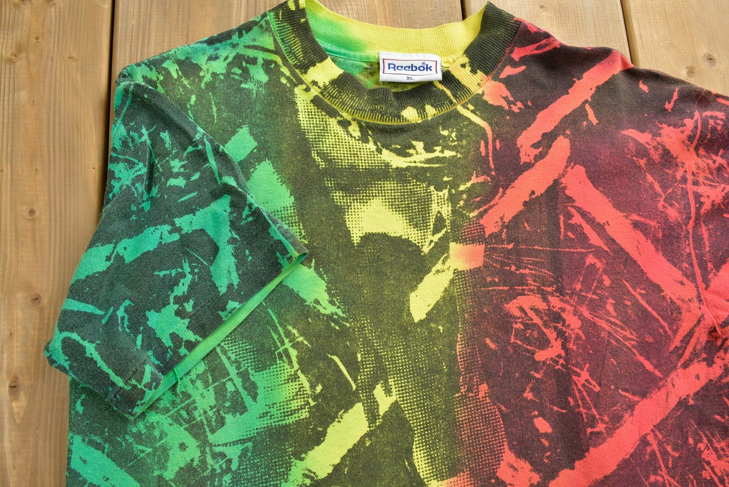 Vintage Early 1990s Reebok Black Top T-shirt Men's Medium from propervintagecanada