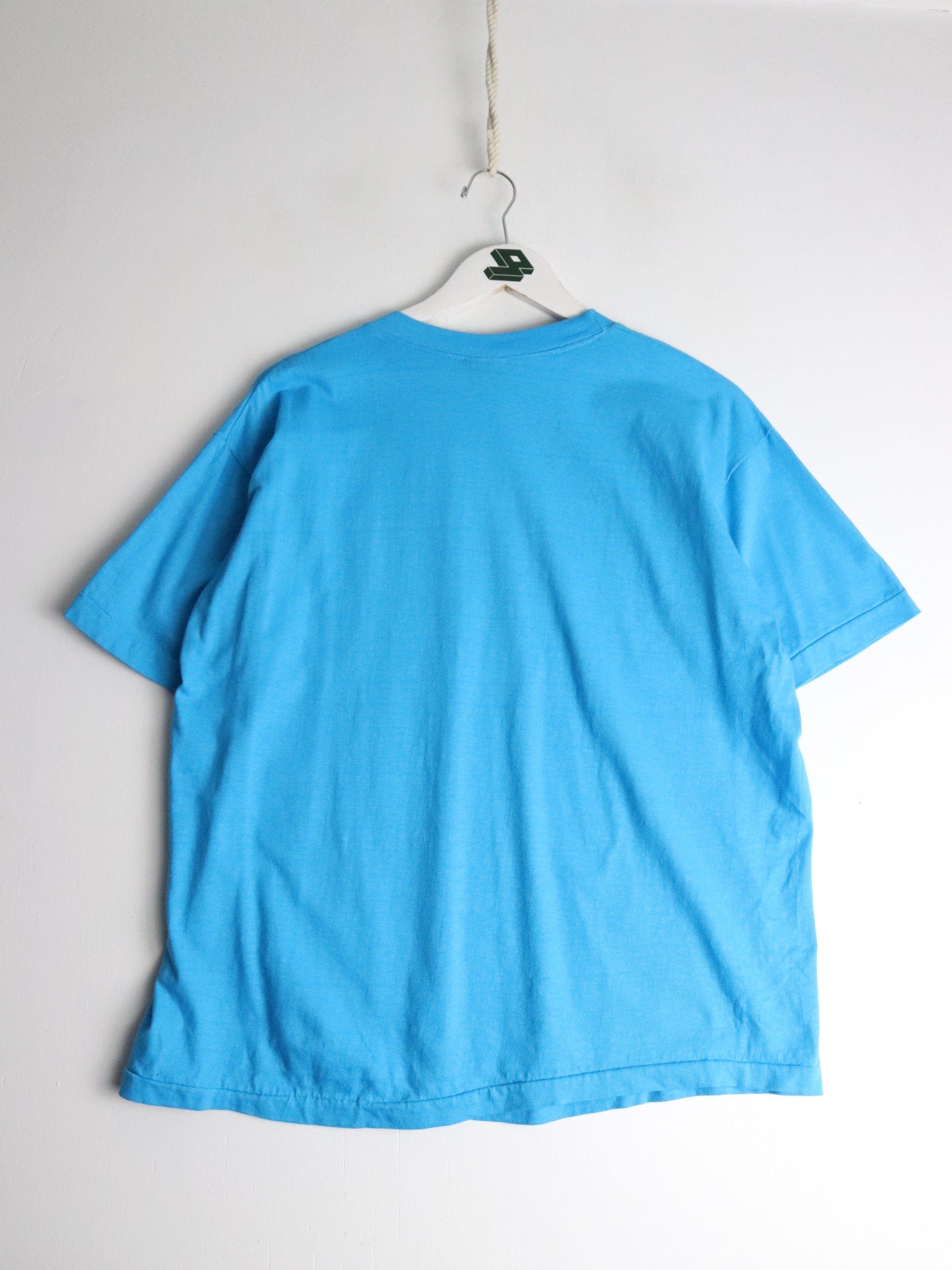 Vintage God Doesn't Ask T Shirt Mens Medium Blue 90s from propervintagecanada