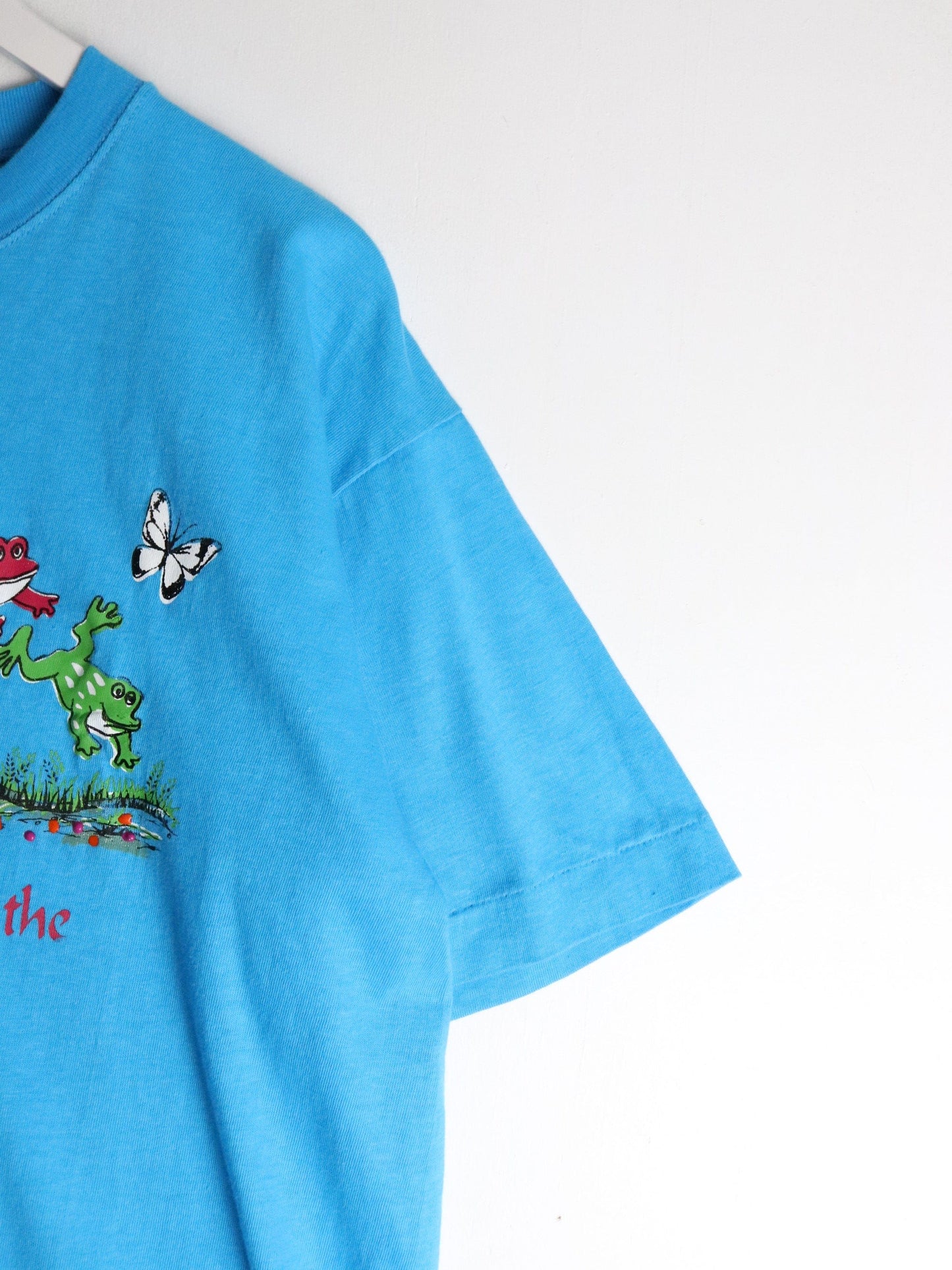 Vintage God Doesn't Ask T Shirt Mens Medium Blue 90s from propervintagecanada