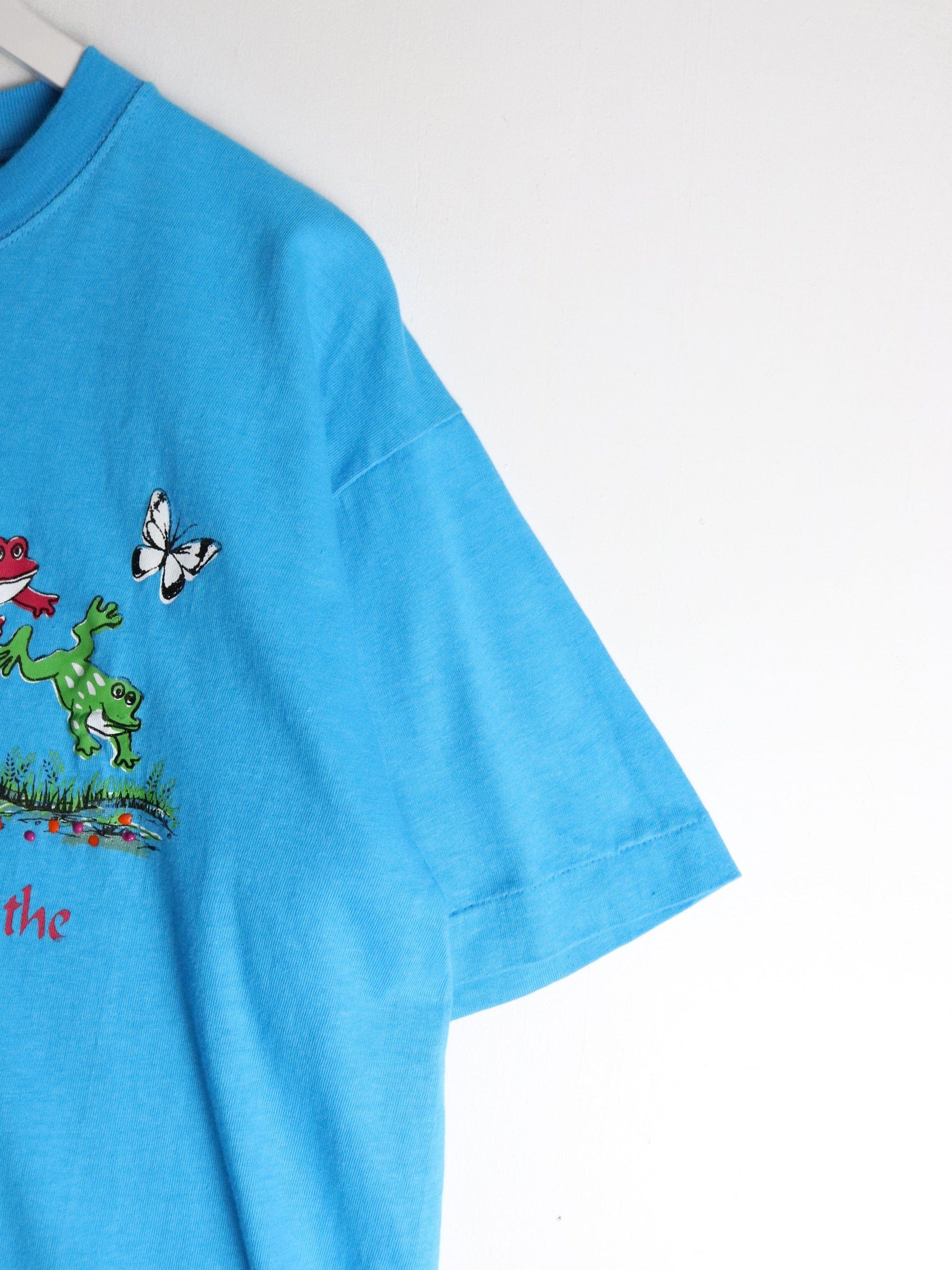 Vintage God Doesn't Ask T Shirt Mens Medium Blue 90s from propervintagecanada
