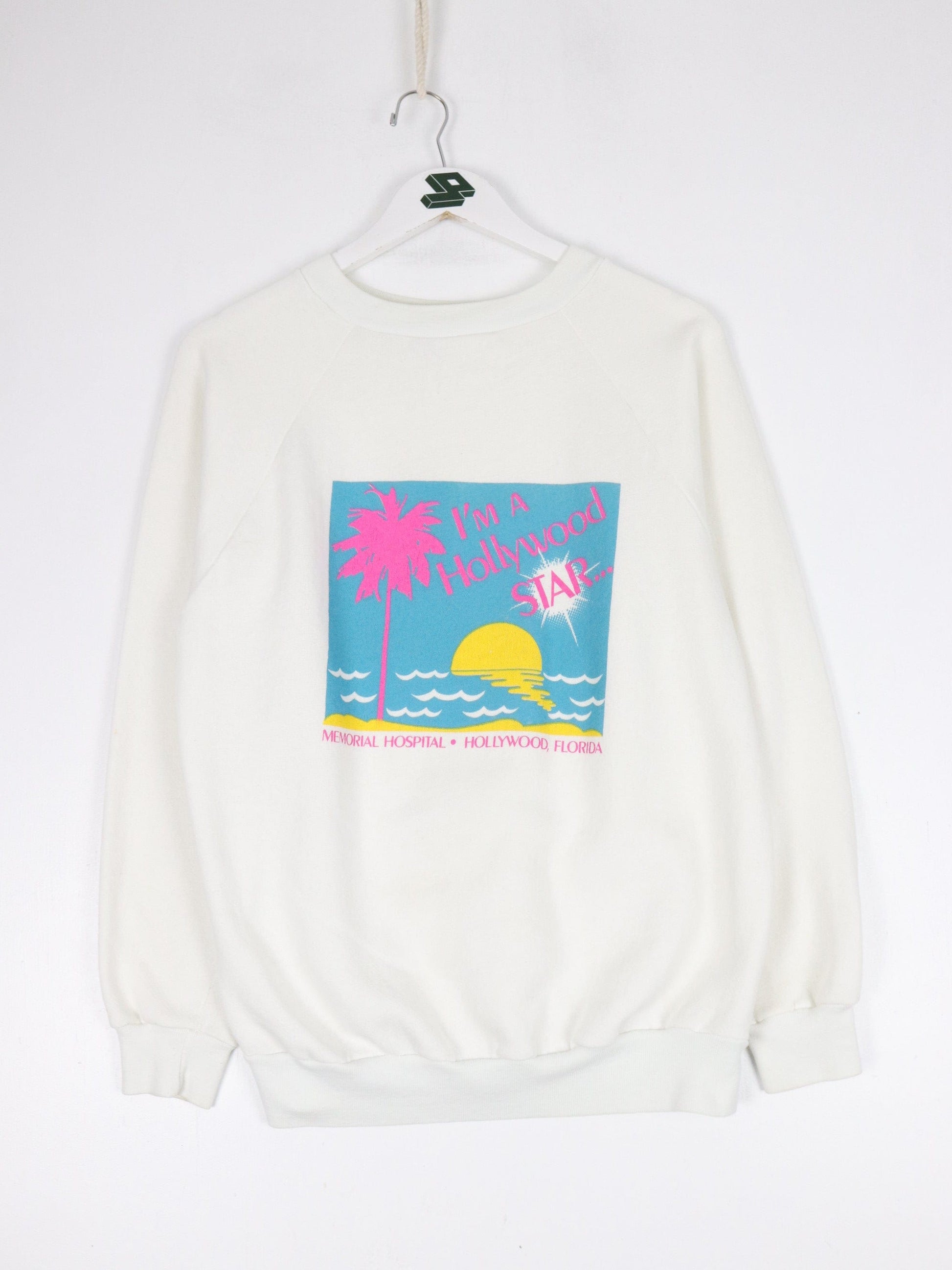 Vintage Hollywood Memorial Hospital Sweatshirt Fits Mens Small White 80s from propervintagecanada