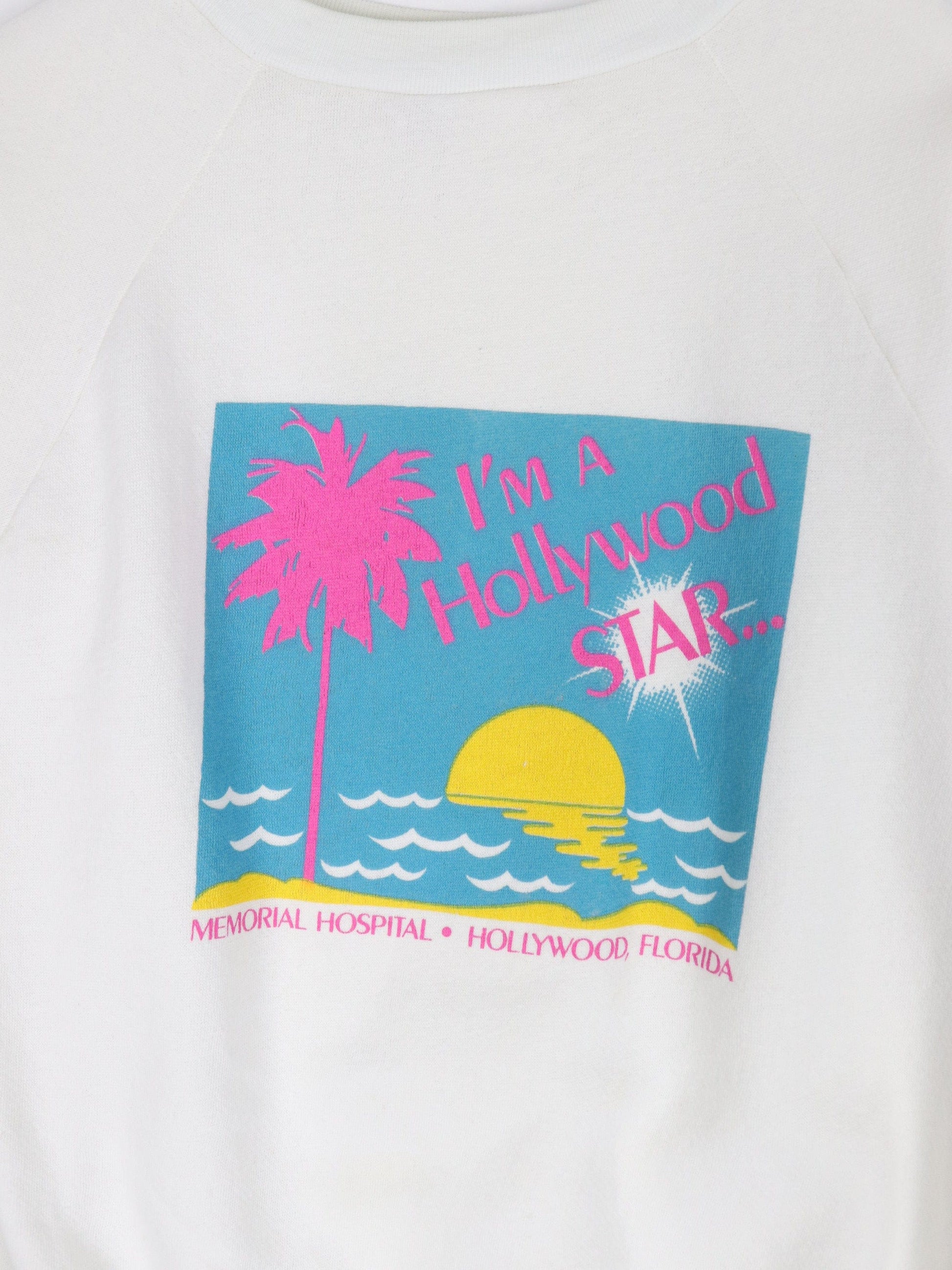 Vintage Hollywood Memorial Hospital Sweatshirt Fits Mens Small White 80s from propervintagecanada