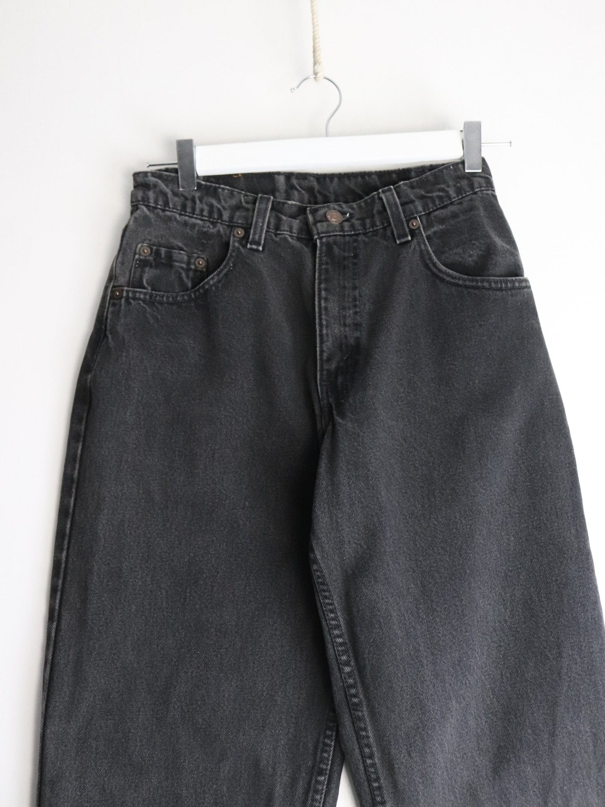 Vintage Levi's Denim Jeans Mens 27 x 31 Black 560 Loose Tapered from propervintagecanada