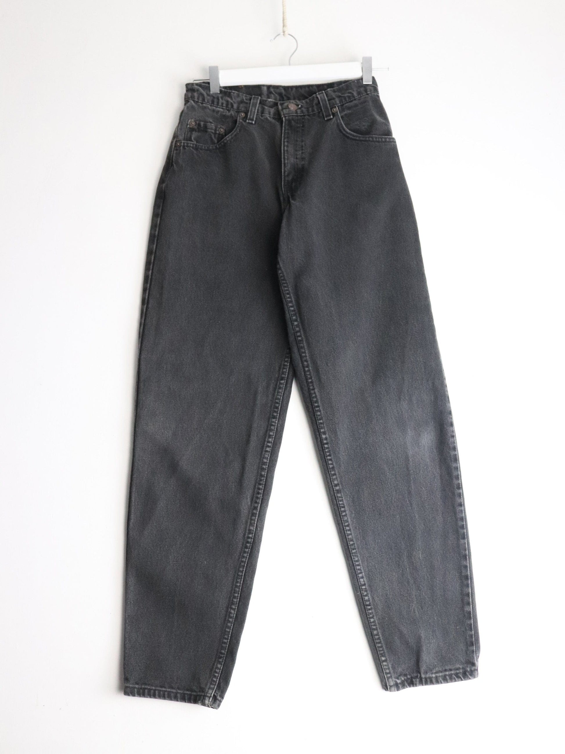Vintage Levi's Denim Jeans Mens 27 x 31 Black 560 Loose Tapered from propervintagecanada