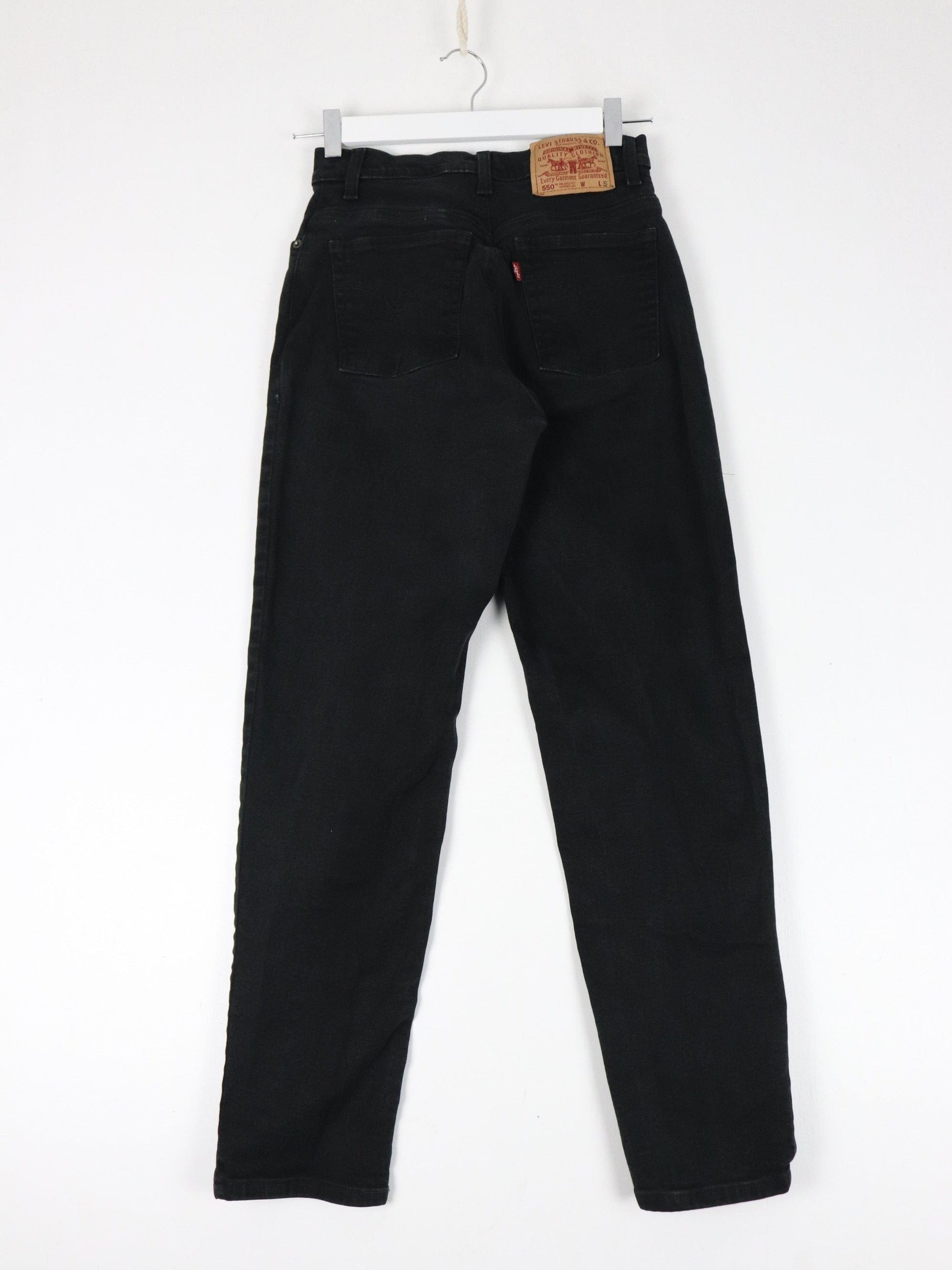 Vintage Levi's Pants Womens 4 Black Denim Jeans 550 Relaxed Tapered 25 x 28 from propervintagecanada