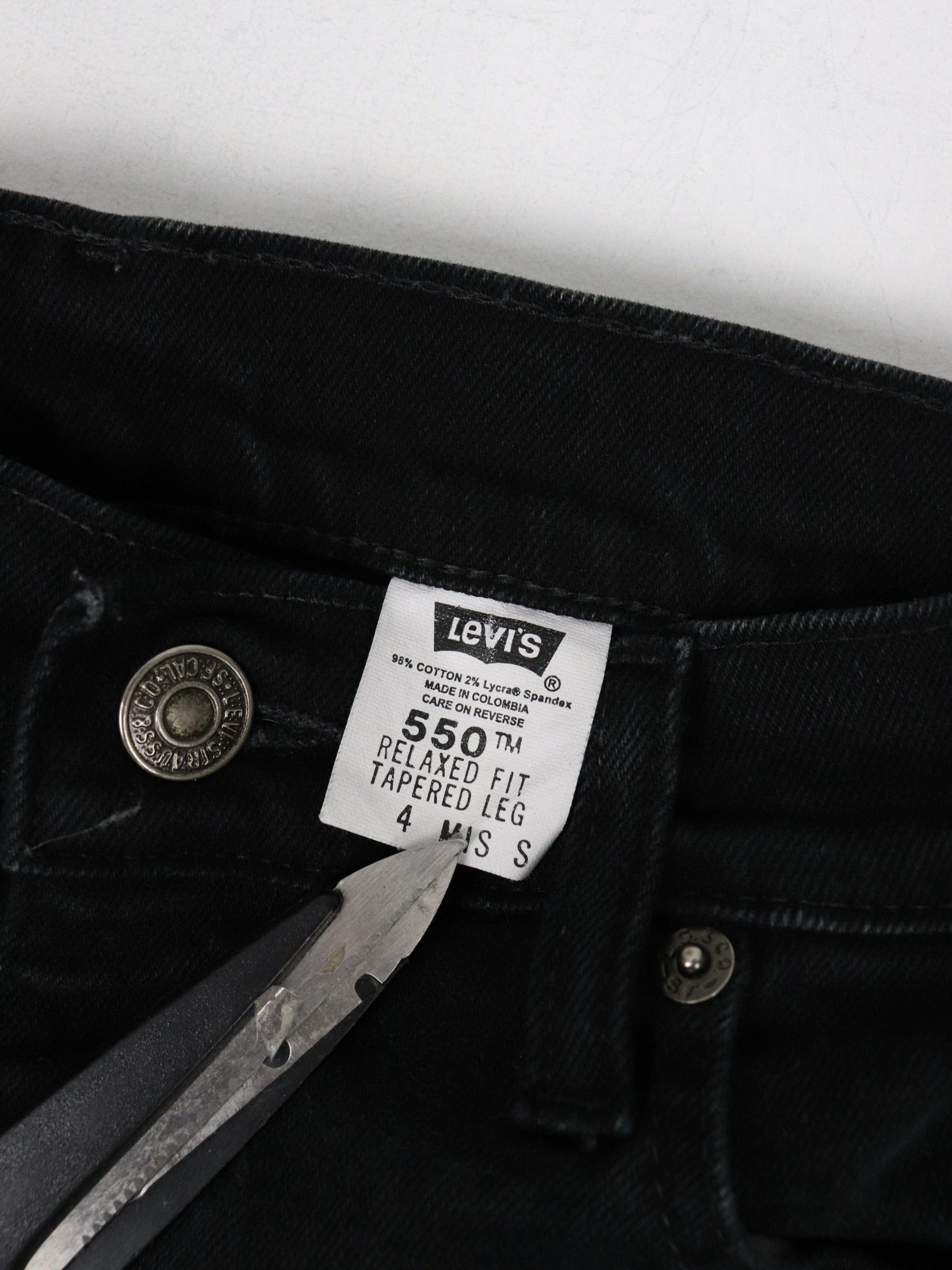 Vintage Levi's Pants Womens 4 Black Denim Jeans 550 Relaxed Tapered 25 x 28 from propervintagecanada