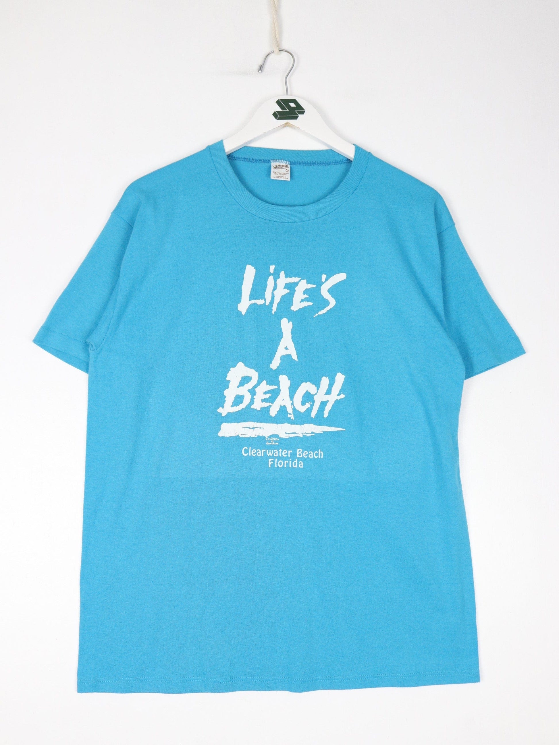 Vintage Life's A Beach T Shirt Fits Mens Large Blue 80s Funny USA from propervintagecanada